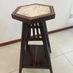 Wooden high side marble top table with line of mortar of pearl