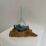 Glass decanter with teakwood base